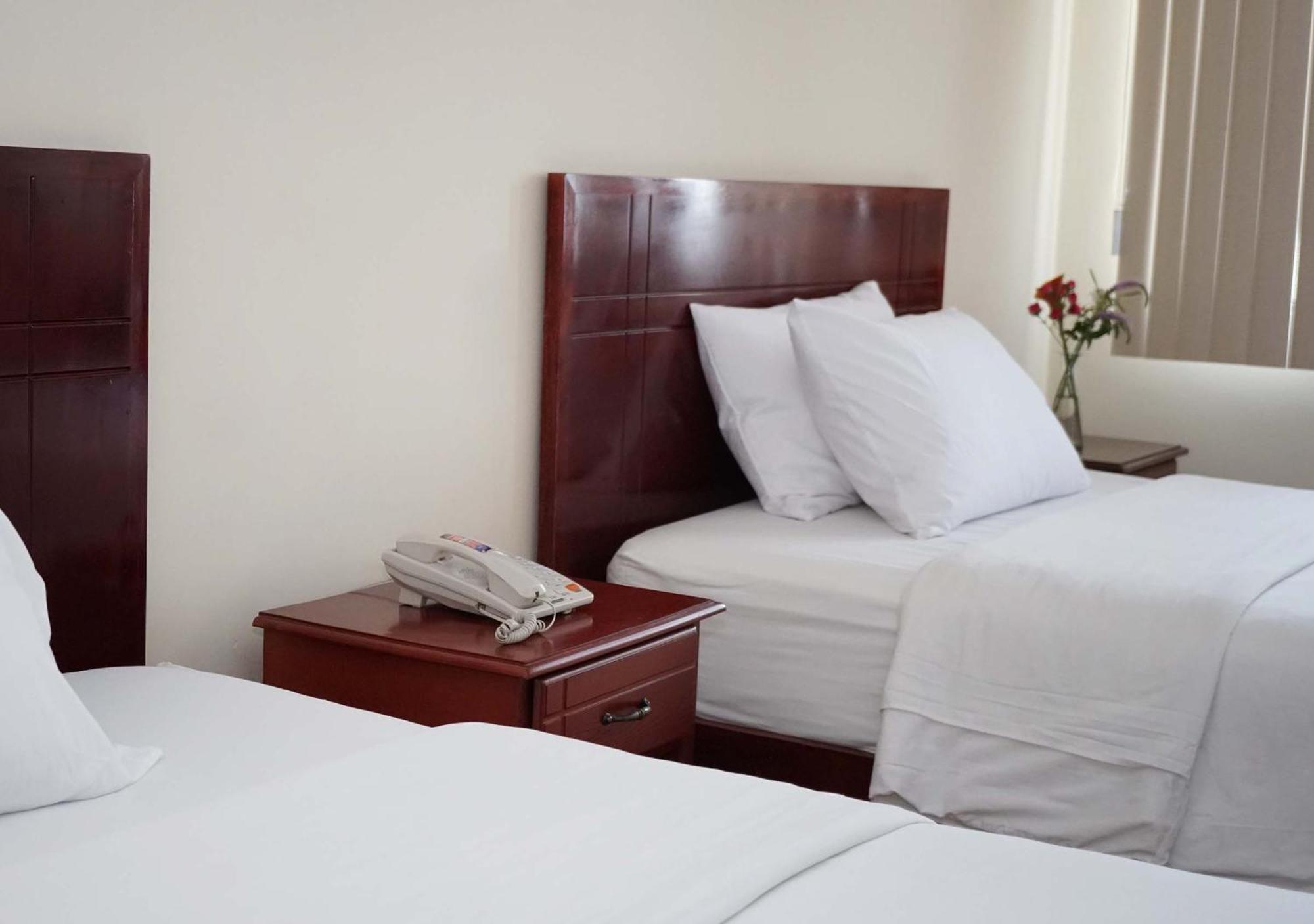 Hotel Lottus Кито Номер фото
